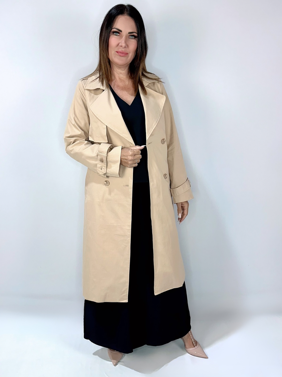 Kerry's Style Sessions beige trench coat over a black outfit with nude heels.