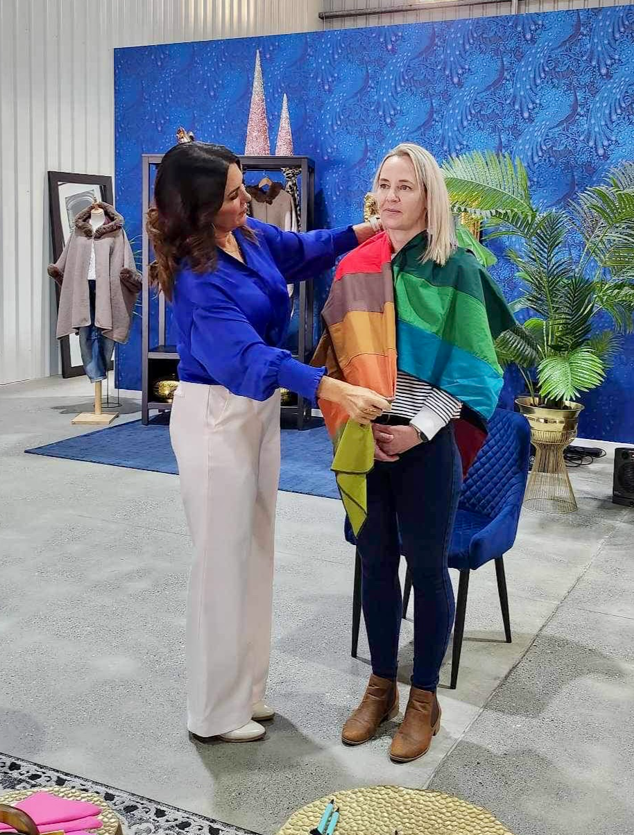 Personal stylist assisting a client with a colour analysis session.