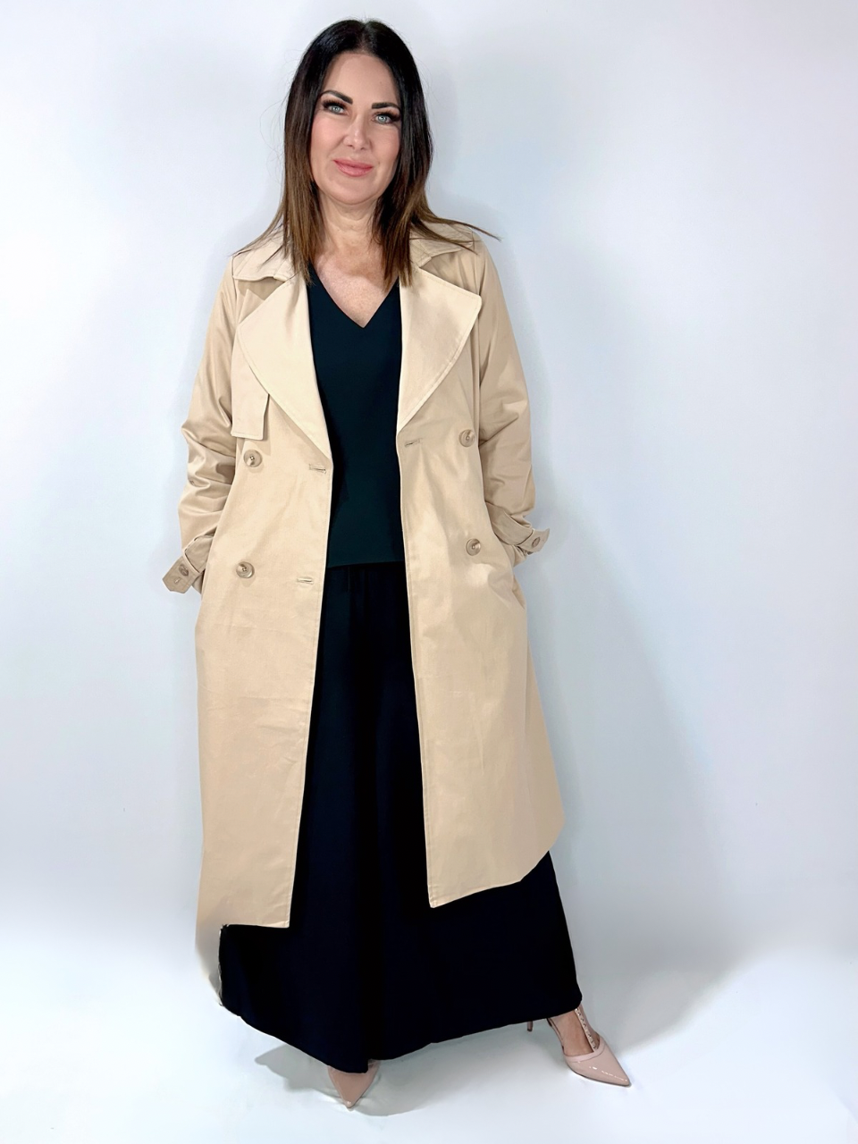 Kerry's Style Sessions beige trench coat over a black outfit with nude heels.